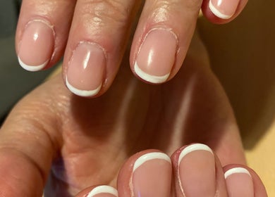 French manicure at Nail Nook in Bingley, England, GB, showcasing clean white tips and a glossy finish.