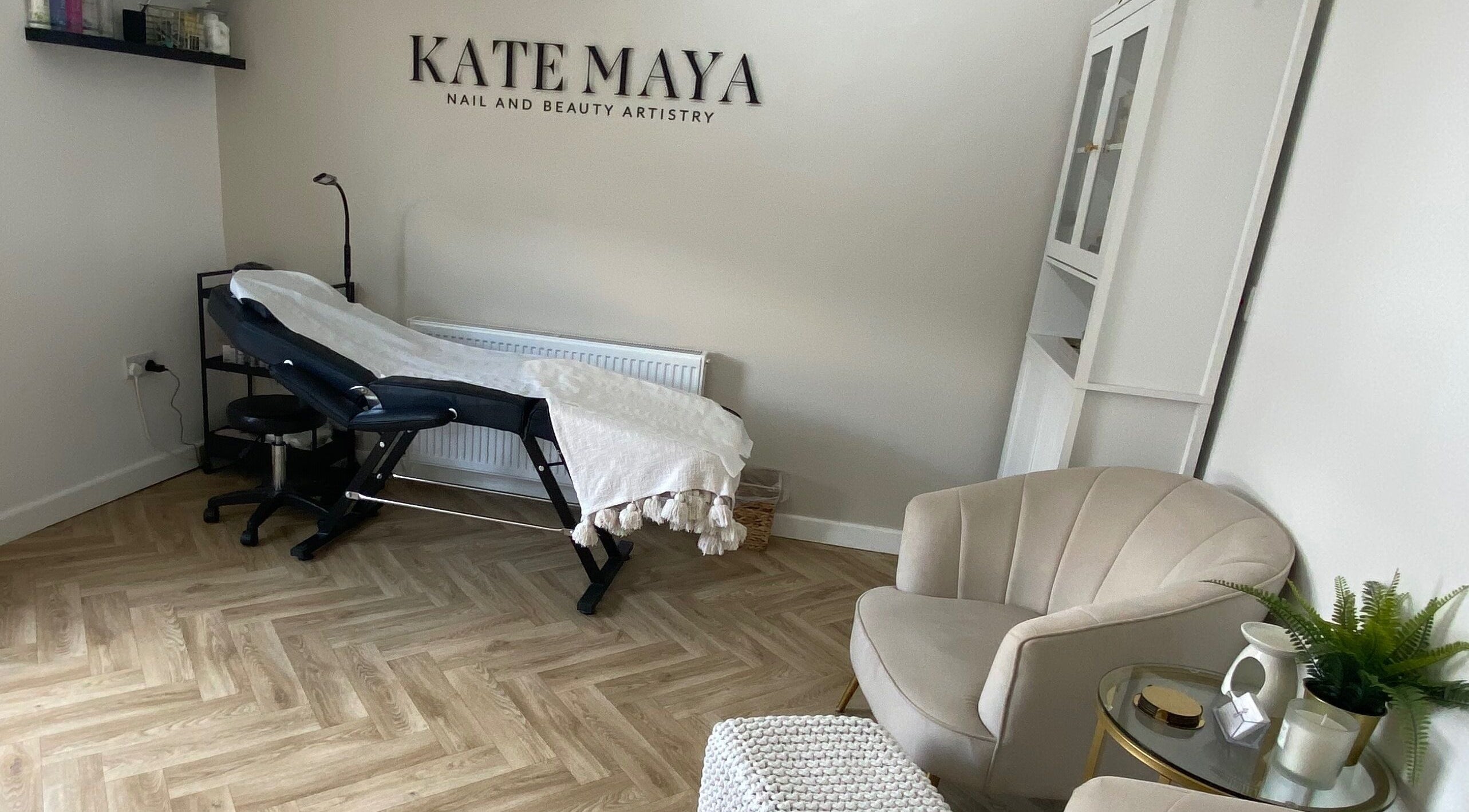 Luxury therapy room at Kate Maya Nail & Beauty Artistry, Orrell, England, GB, featuring elegant decor.