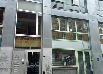 Exterior view of Selfie Lounge, London, England, GB, showcasing large glass windows and metal panels.