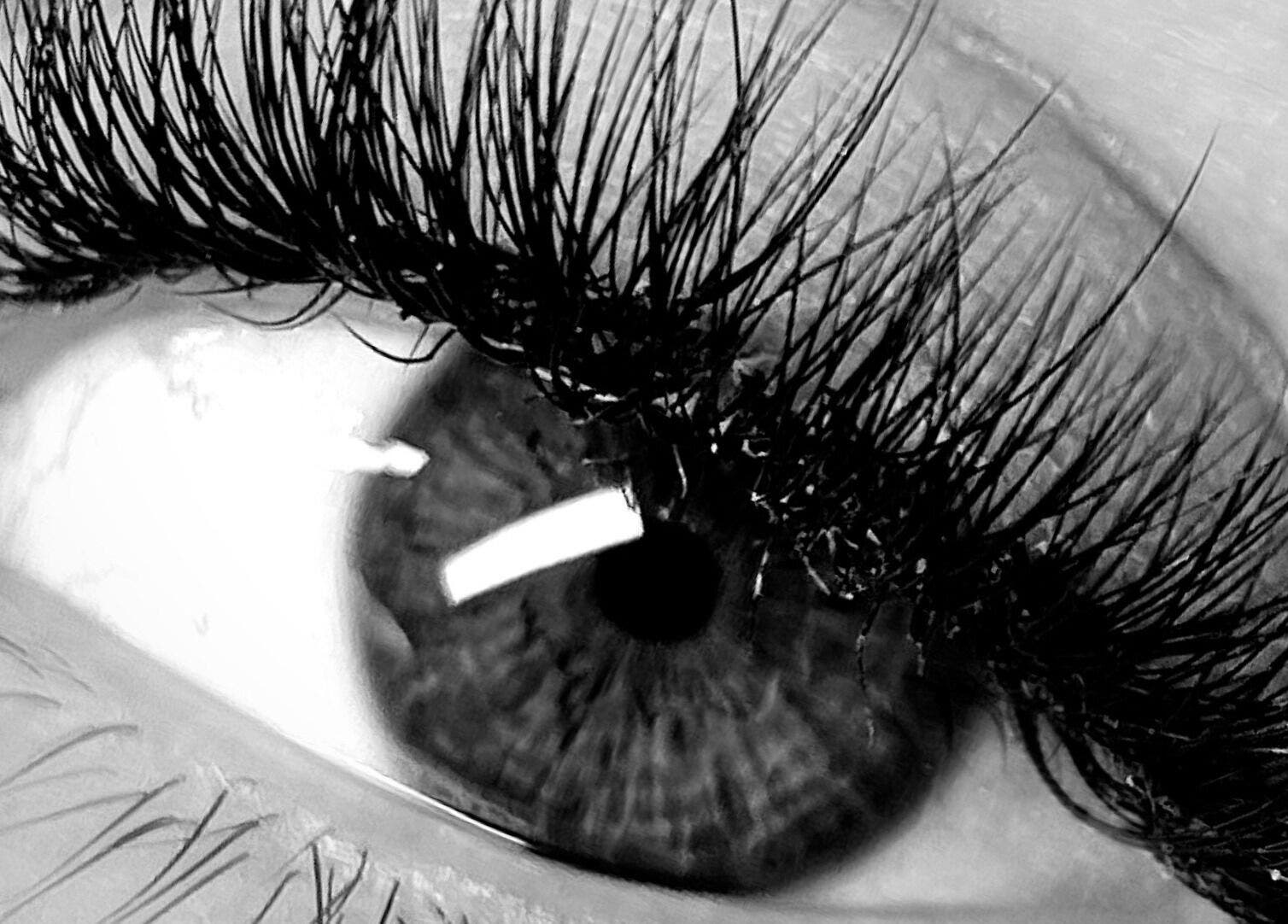 Close-up of lush eyelashes at ABeauty's, Alexis in London, England, GB showcasing beauty expertise.