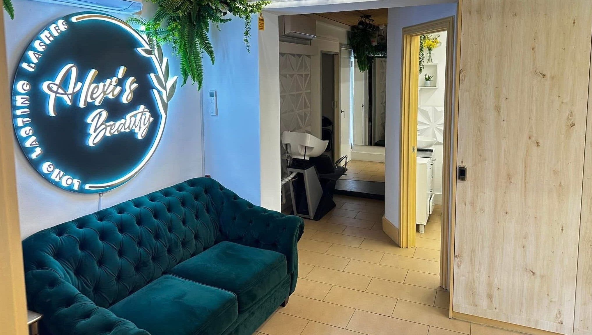 Cozy lounge at ABeauty's, Alexis in London, England, GB featuring chic decor and lush seating.