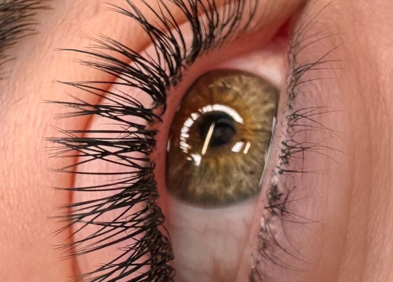 Closeup of enhanced eyelashes at ABeauty's, Alexis in London, England, GB, highlighting lash artistry.