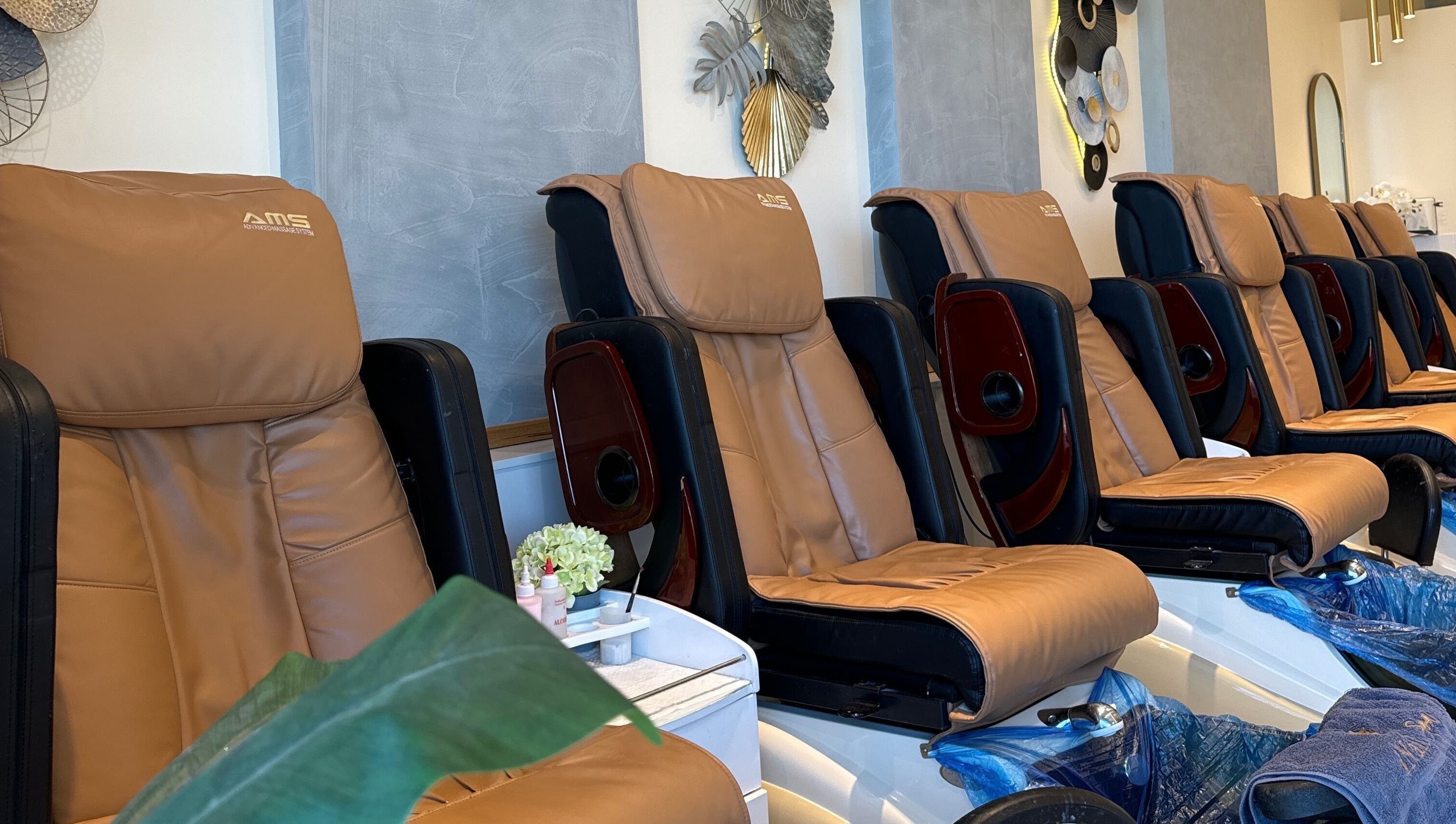 Relaxing massage chairs at iNail Spa, Mentone, Victoria, AU, promising a tranquil wellness experience.