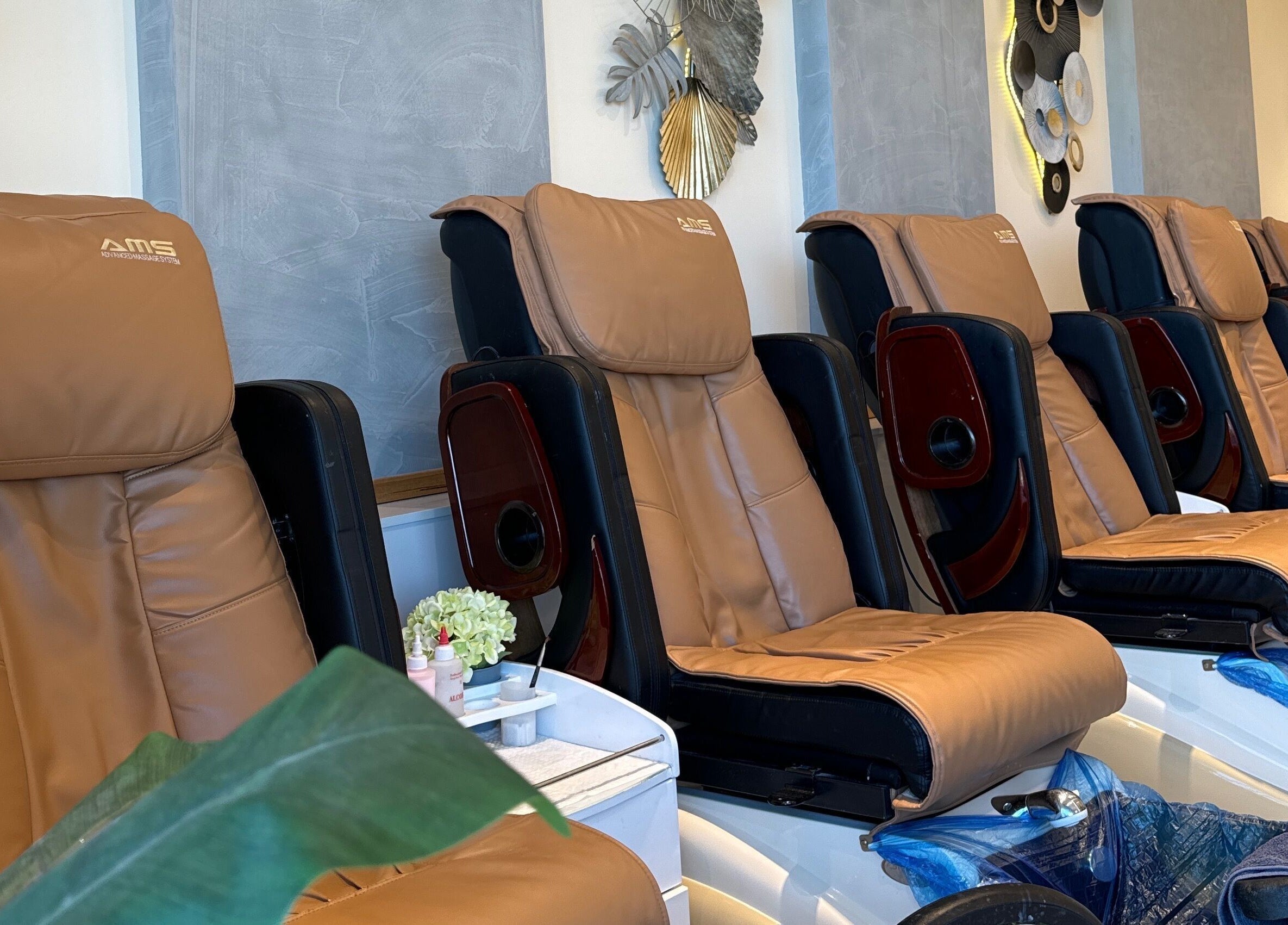 Relaxing massage chairs at iNail Spa, Mentone, Victoria, AU, promising a tranquil wellness experience.
