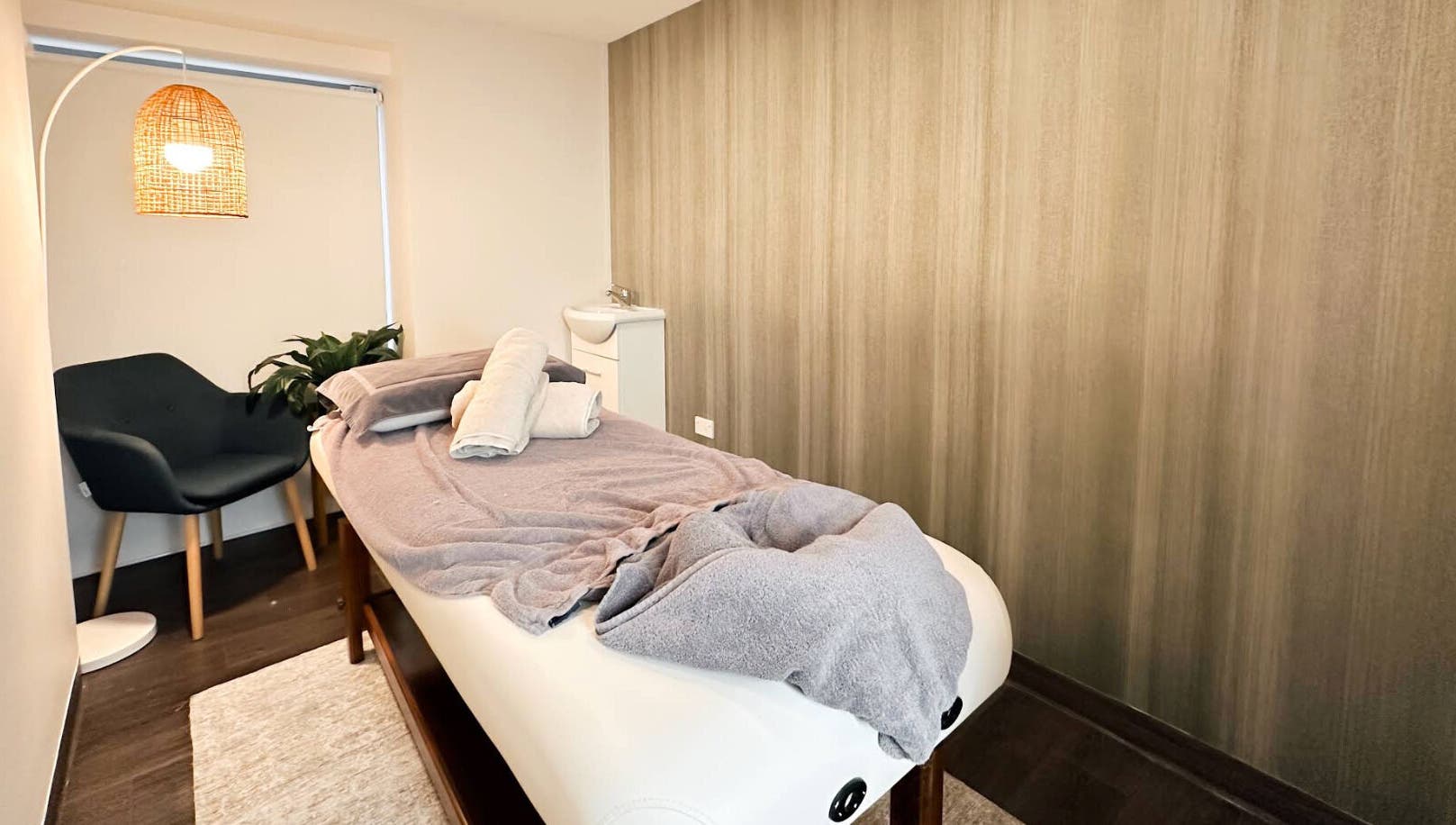Relaxing massage room at The Serenity Bungalow, Drummoyne, New South Wales, AU with cozy settings.