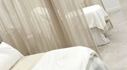 Relaxing treatment beds at House of Terri Brows in Rozelle, New South Wales, AU, offering serene ambiance.