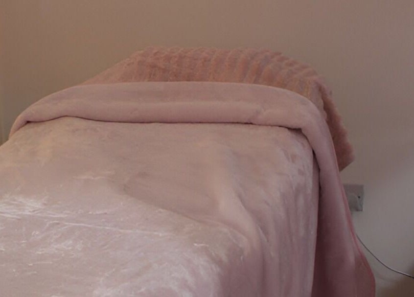 Luxurious massage bed at No.8 The Nail and Beauty Lounge, Gressenhall, England, GB.