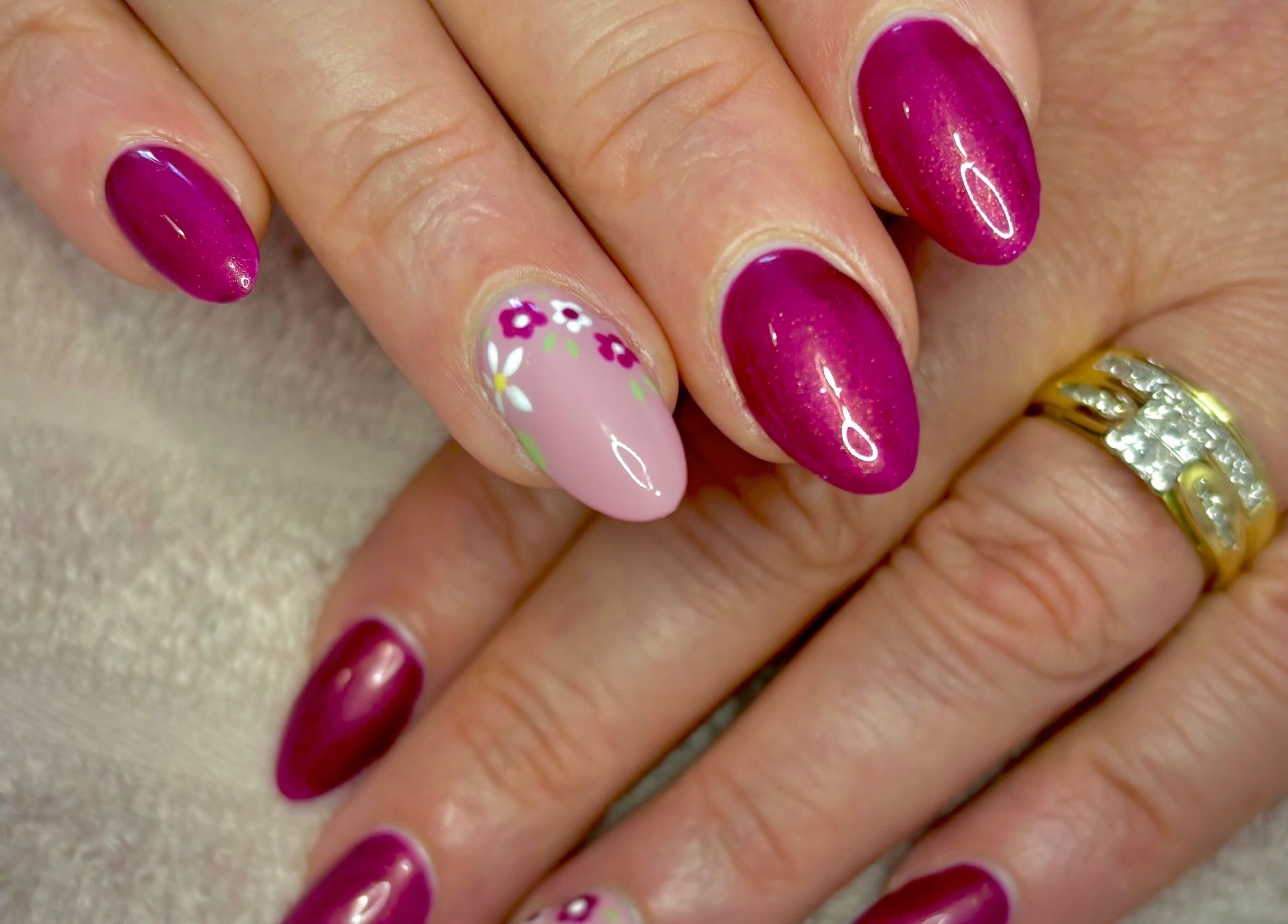 Elegant floral nail designs at No.8 The Nail and Beauty Lounge in Gressenhall, England, GB.