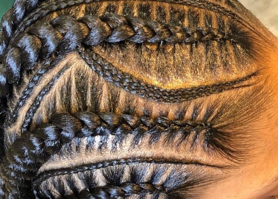 Close-up of intricate braiding at The Braiding Vault Uk, London, England, GB showcasing skilled craftsmanship.
