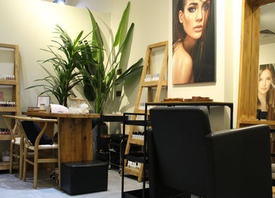 Inviting interior of Hair Corner Salon in Dubai, AE, featuring products and stylish decor for premium beauty services.