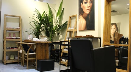 Inviting interior of Hair Corner Salon in Dubai, AE, featuring products and stylish decor for premium beauty services.