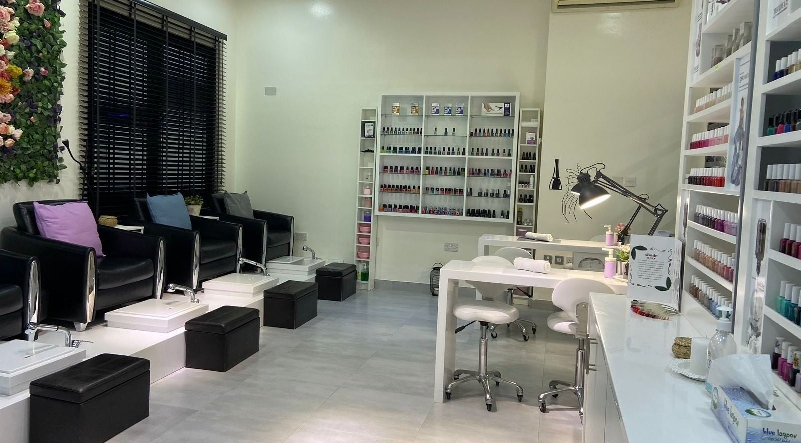 Chic nail salon interior at Hajir Ladies Salon - Khalifa City Branch, أبو ظبي, أبو ظبي, AE with stylish chairs.