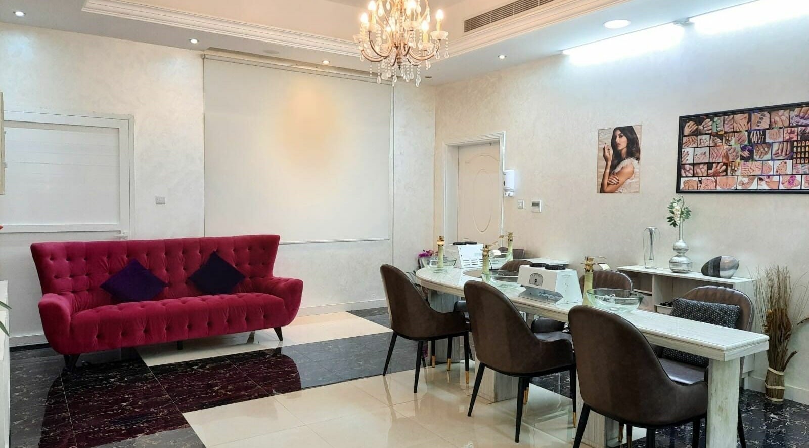 Luxurious interior of Hajir Ladies Salon - Shamkha Branch in Abu Dhabi, AE, featuring plush seating and chic decor.