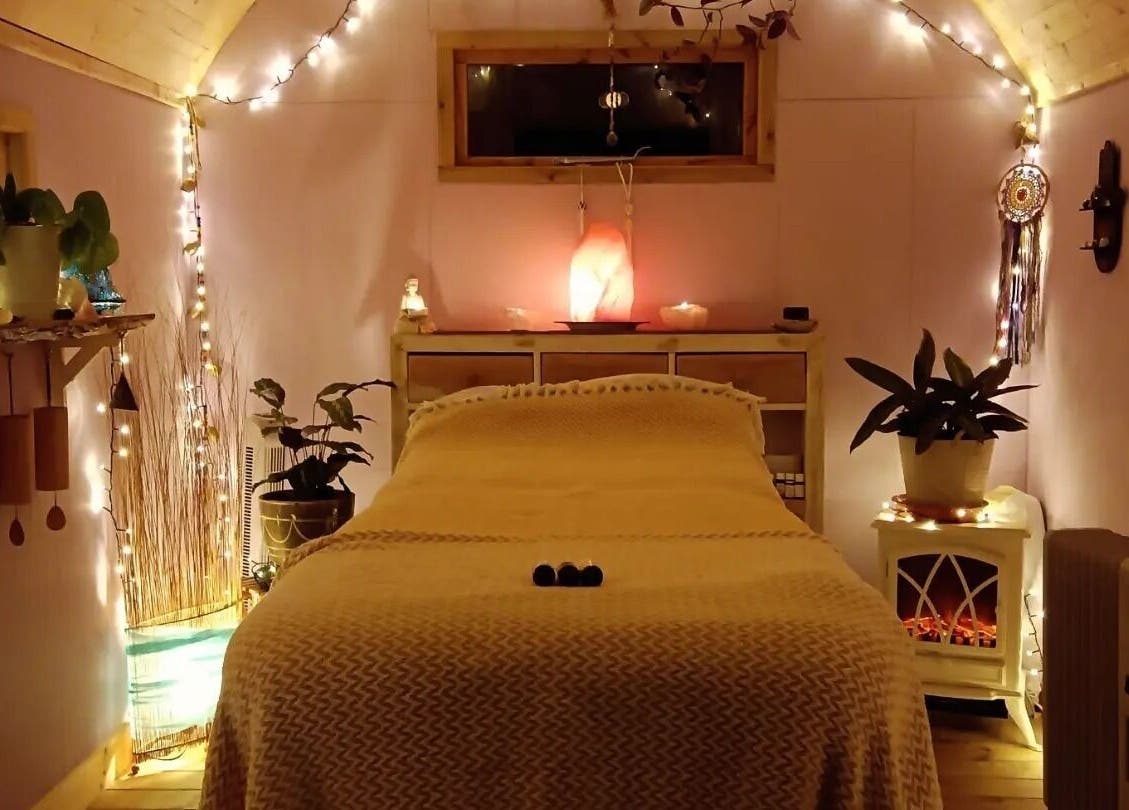 Warm therapy room at Hayle Cornish Holistic Therapies in Hayle, GB with soft lighting and tranquil decor.
