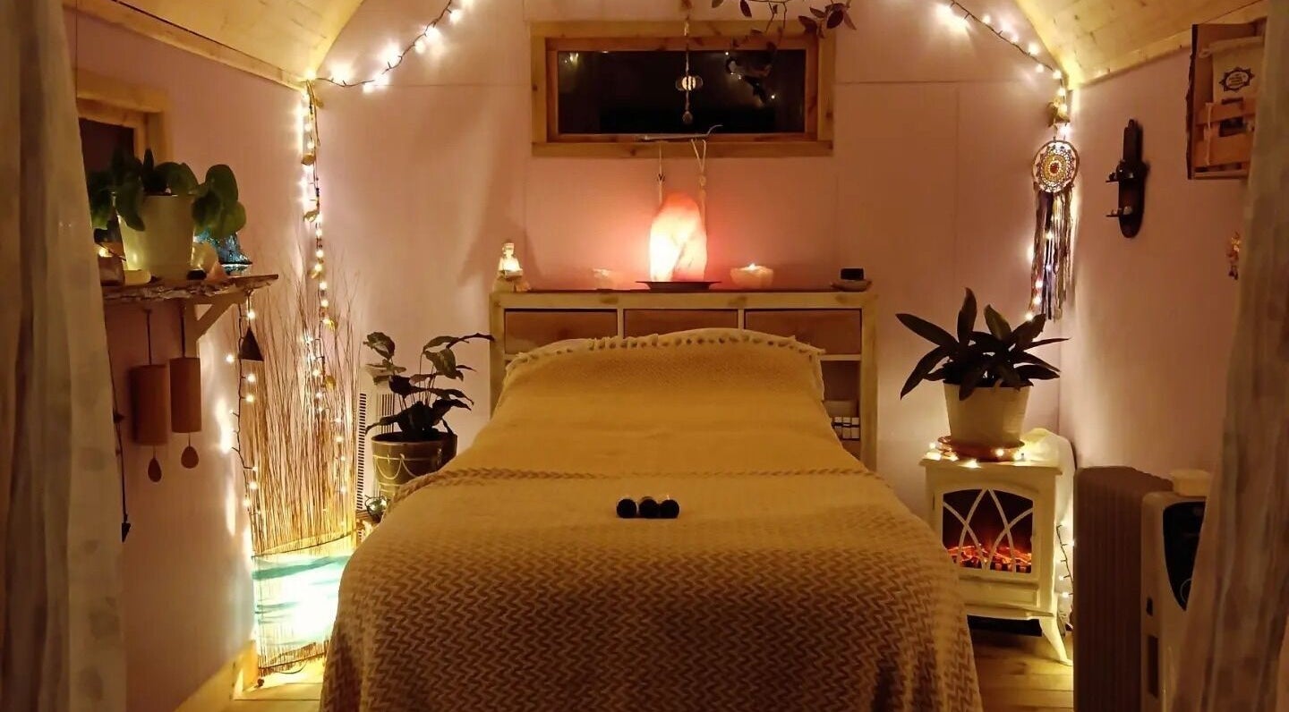 Warm therapy room at Hayle Cornish Holistic Therapies in Hayle, GB with soft lighting and tranquil decor.