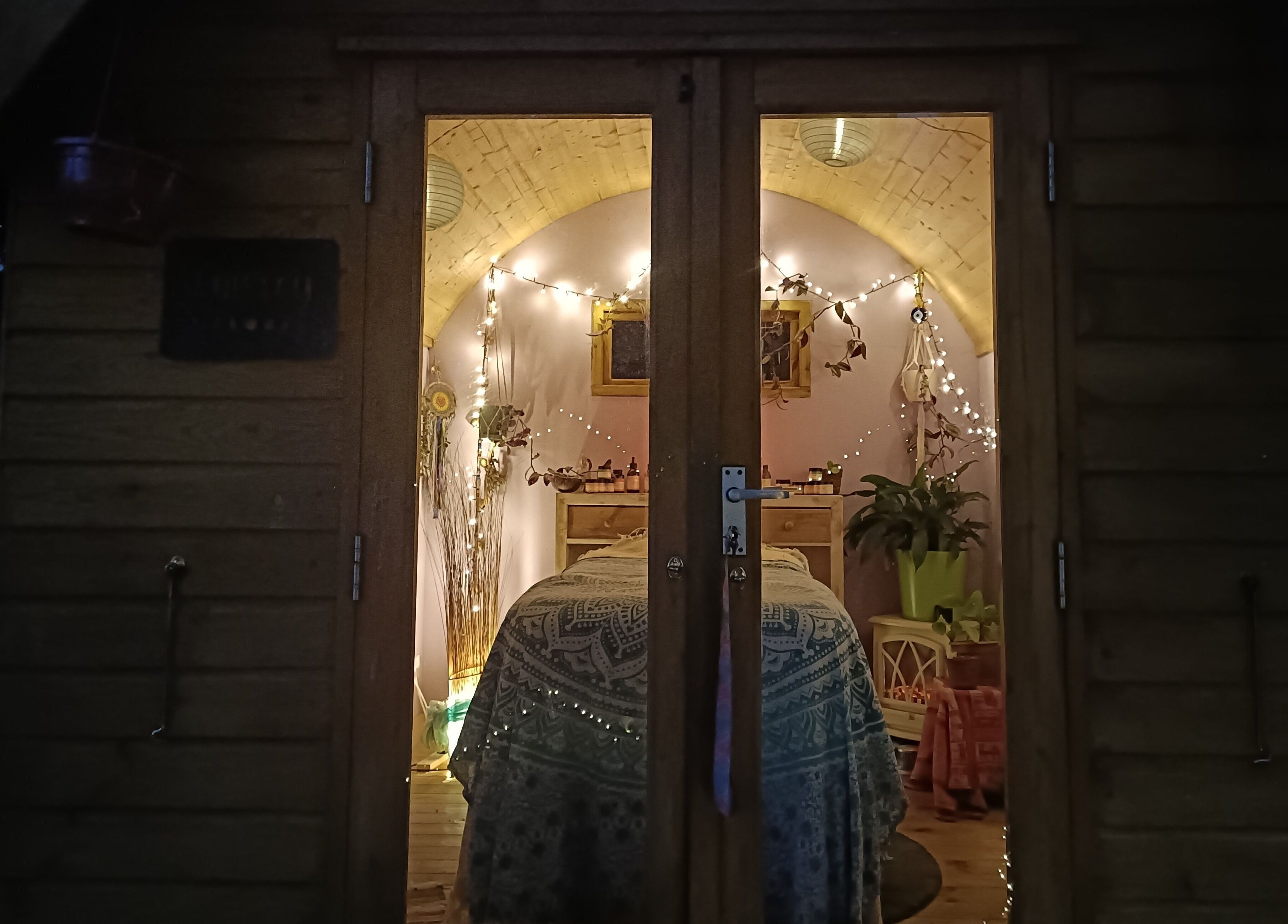 Cozy therapy room at Hayle Cornish Holistic Therapies in Hayle, GB with warm lighting and tranquil decor.