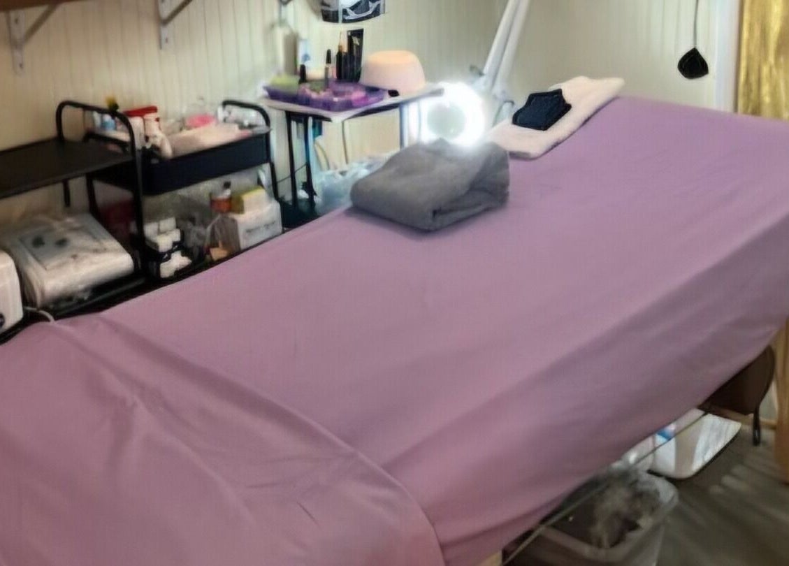 Tranquil massage room at Spa Life Sanctuary in Philadelphia, Pennsylvania, US, featuring a luxuriously prepared table.