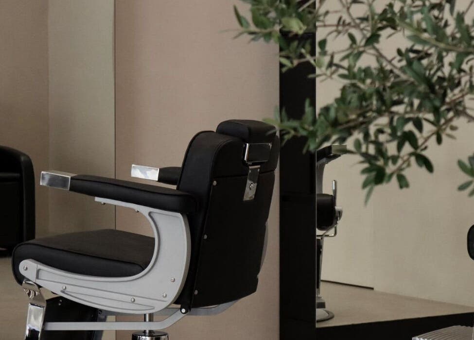 Chic salon chair at Twig, Sharjah, Sharjah, AE, enhanced with modern design and greenery.