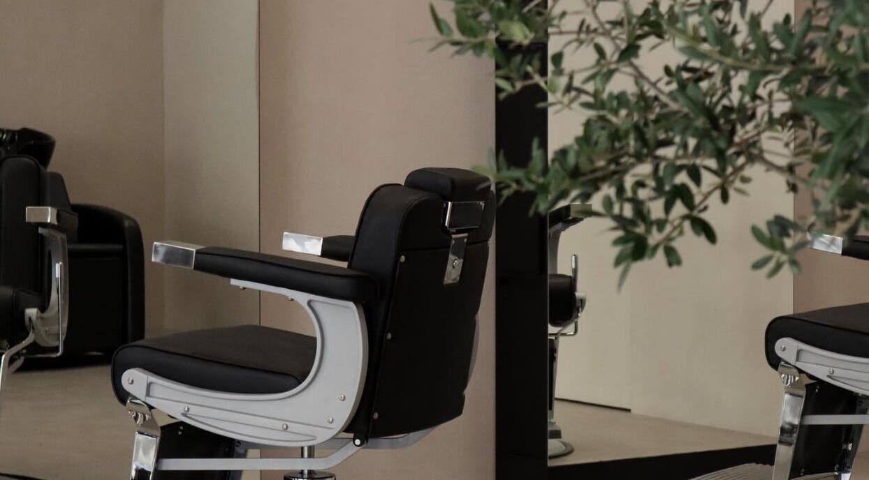 Chic salon chair at Twig, Sharjah, Sharjah, AE, enhanced with modern design and greenery.