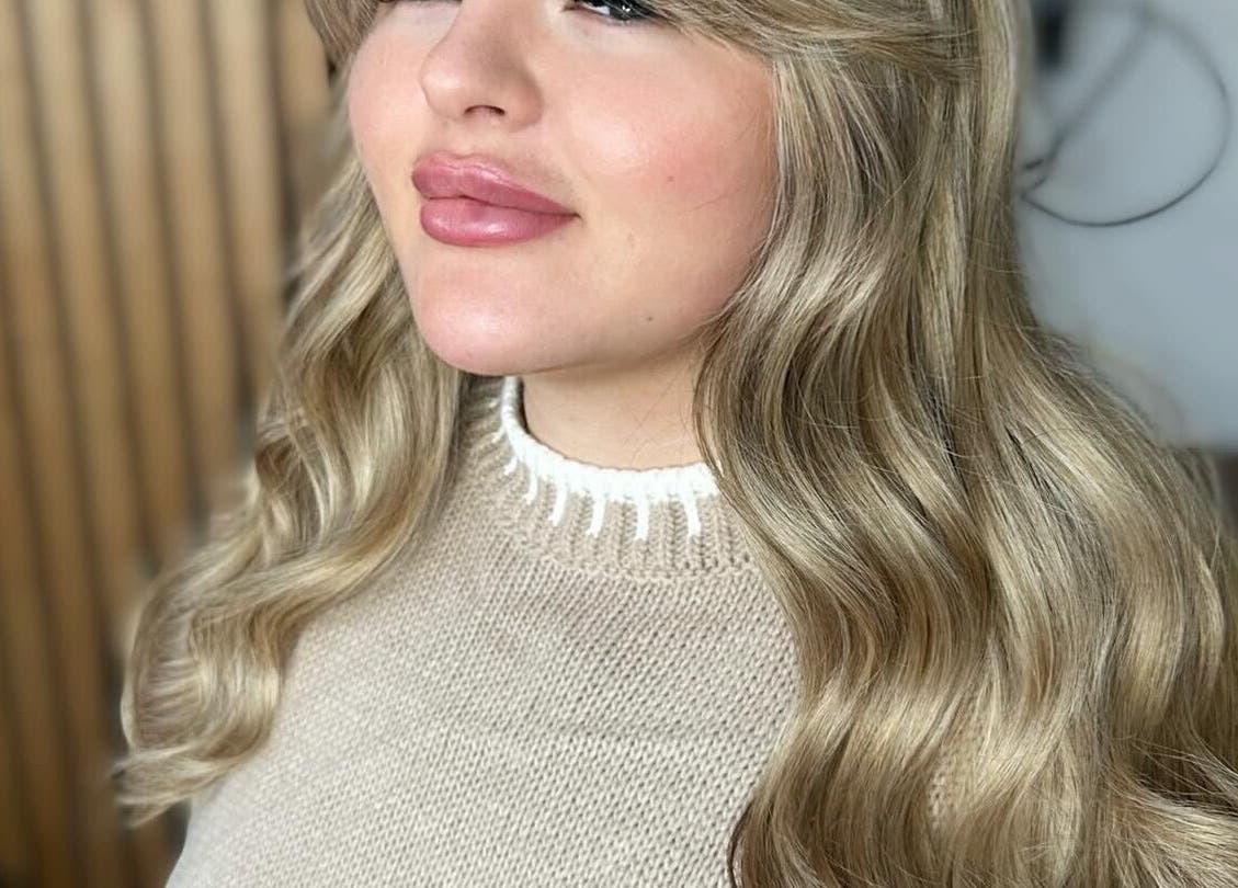 Elegant wavy blonde hairstyle at The Hair Club, Waterlooville, England, GB, showcasing expert styling.