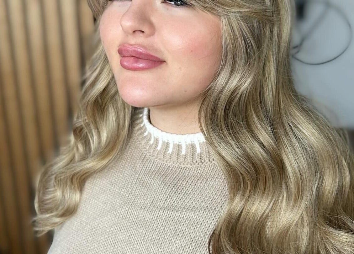 Elegant wavy blonde hairstyle at The Hair Club, Waterlooville, England, GB, showcasing expert styling.