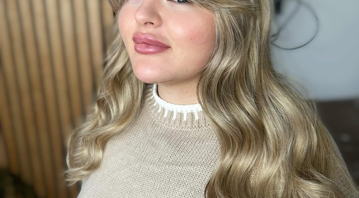 Elegant wavy blonde hairstyle at The Hair Club, Waterlooville, England, GB, showcasing expert styling.