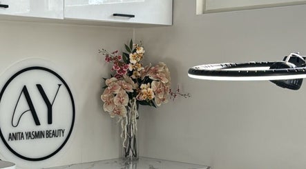 Anita Yasmin beauty logo and flower decor at salon in Leonay, New South Wales, AU.