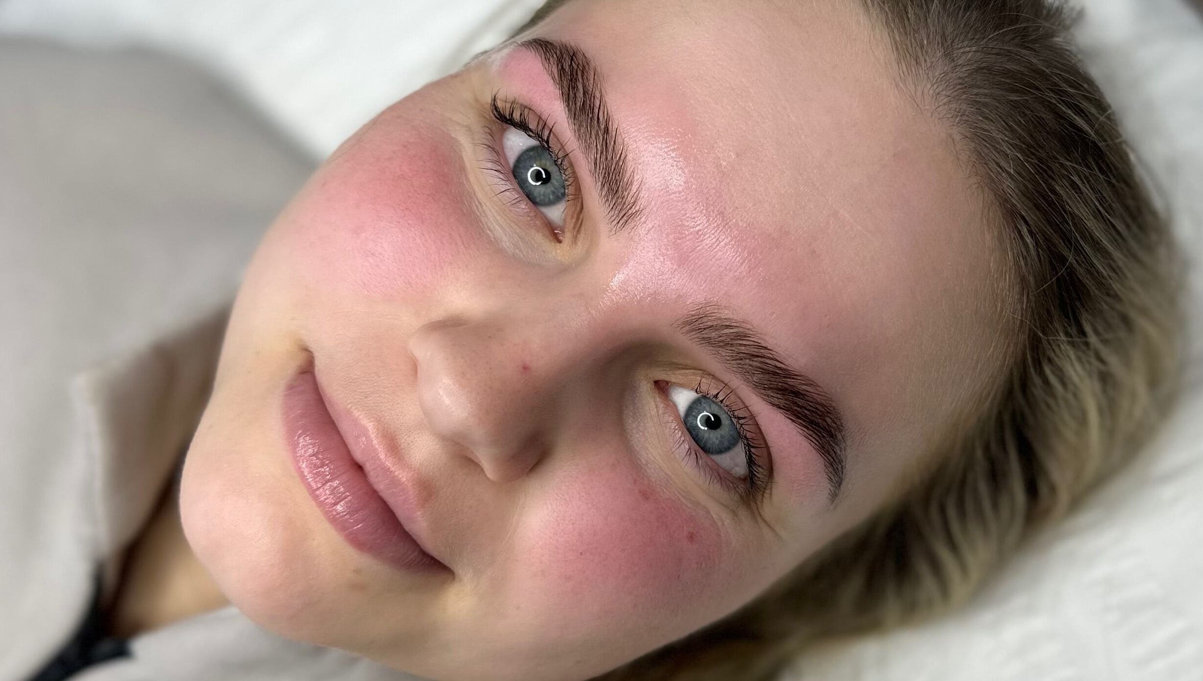 Close-up of a client with glowing skin after treatment at Anita Yasmin Beauty, Warrimoo, New South Wales, AU.