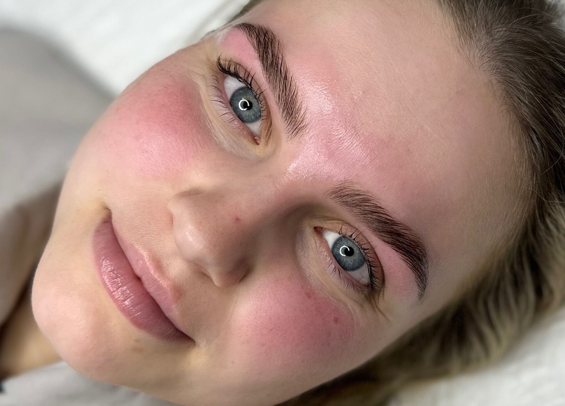Close-up of a client with glowing skin after treatment at Anita Yasmin Beauty, Warrimoo, New South Wales, AU.