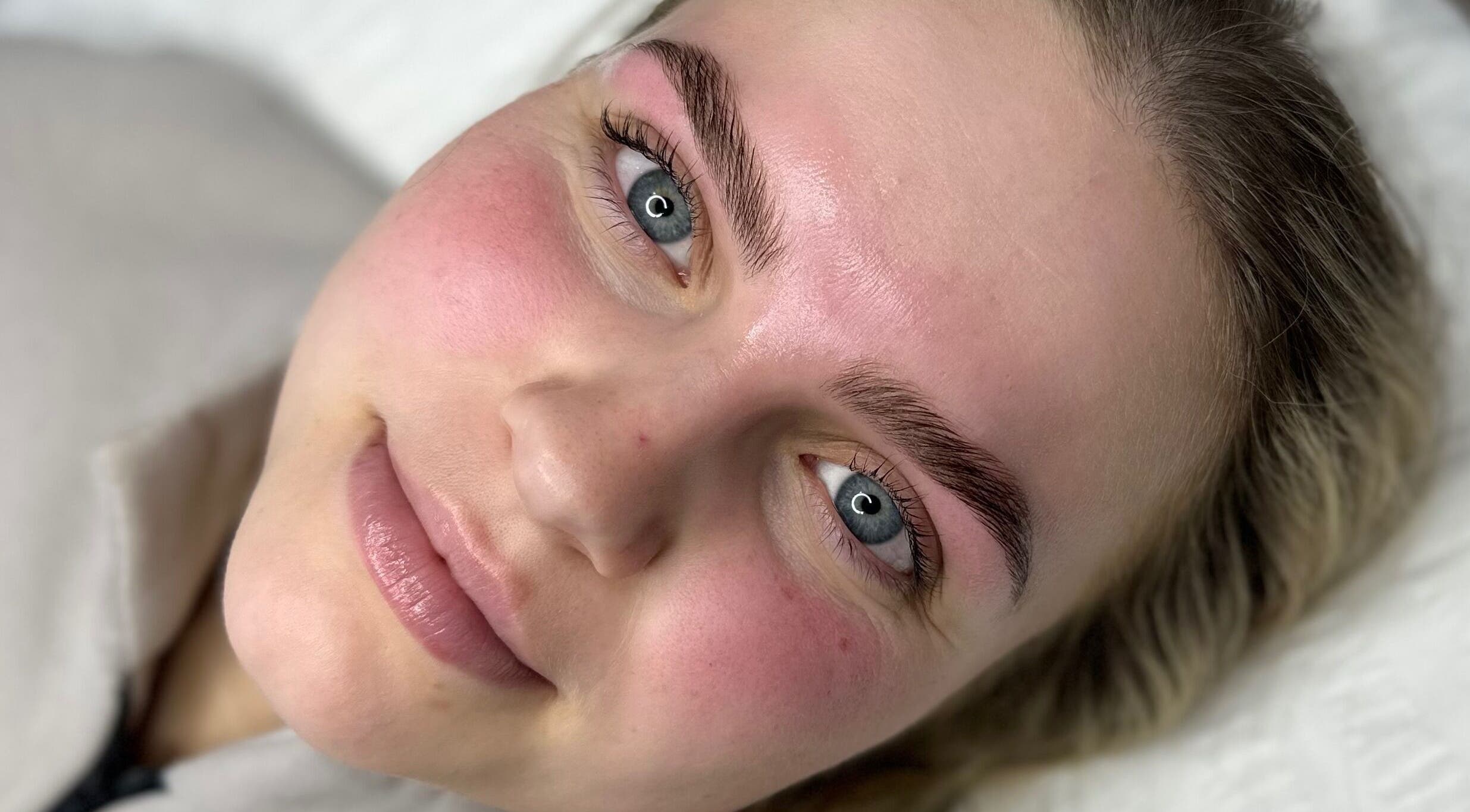 Close-up of a client with glowing skin after treatment at Anita Yasmin Beauty, Warrimoo, New South Wales, AU.