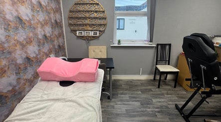 Relaxing therapy room at Lavish Beauty & Aesthetics in Castleford, England, GB with soothing decor and massage table.