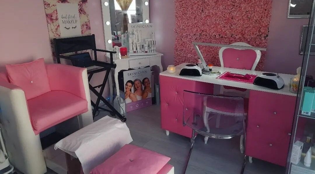 Luxurious salon interior at The Beauty Queen, County Longford, IE with chic pink decor and beauty products.