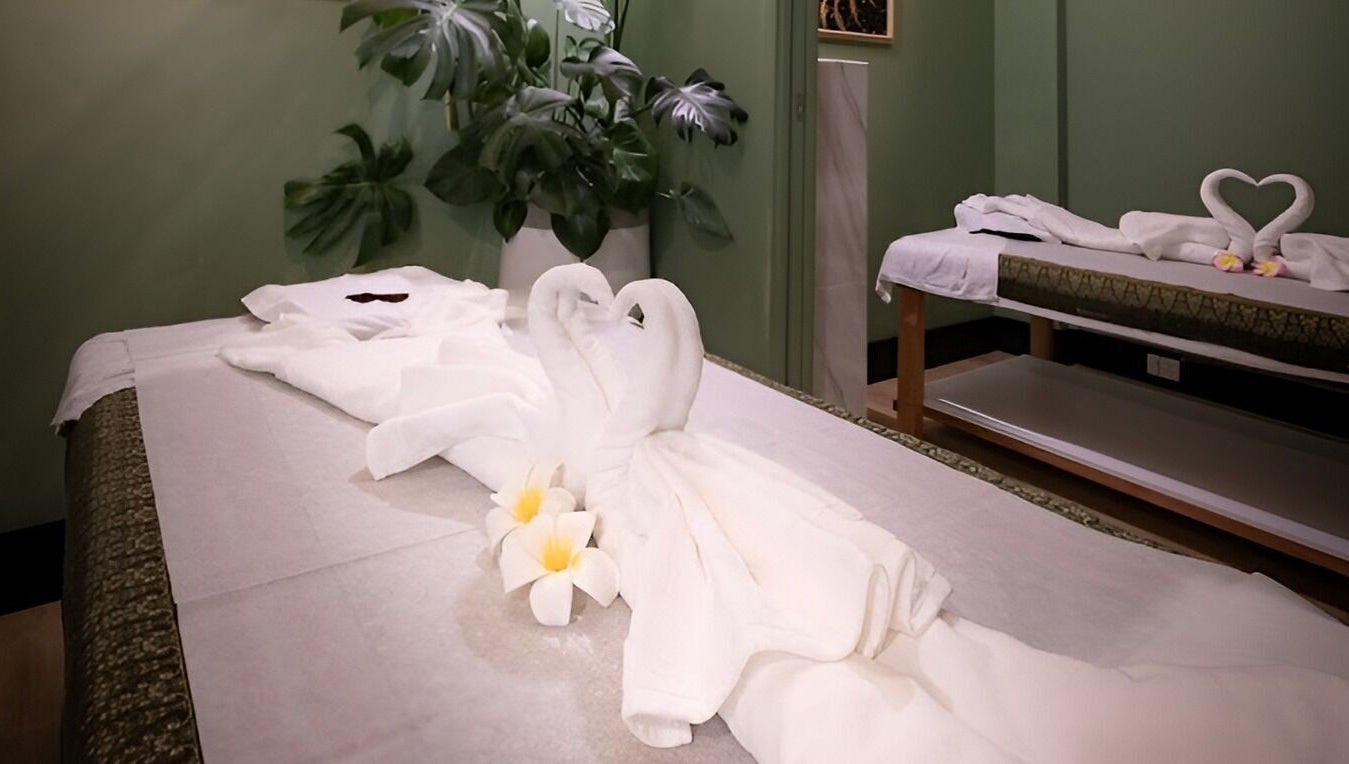 Relaxing massage tables adorned with towel swans at The One Remedial Massage and Spa Five Dock, Five Dock, New South Wales, AU.