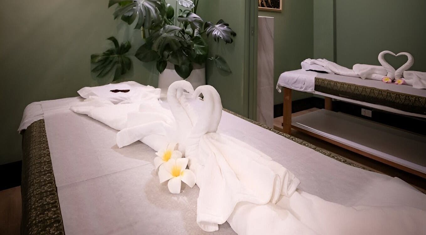 Relaxing massage tables adorned with towel swans at The One Remedial Massage and Spa Five Dock, Five Dock, New South Wales, AU.