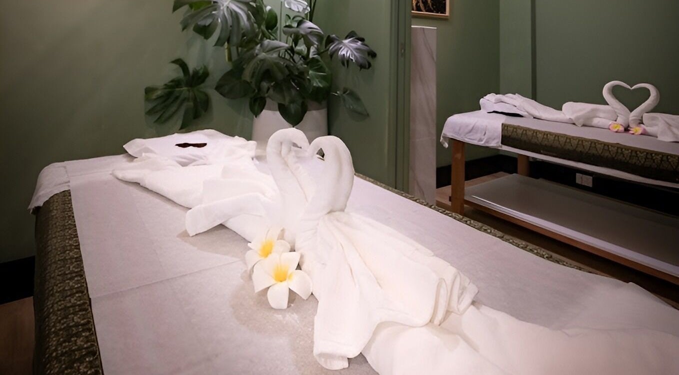 Relaxing massage tables adorned with towel swans at The One Remedial Massage and Spa Five Dock, Five Dock, New South Wales, AU.