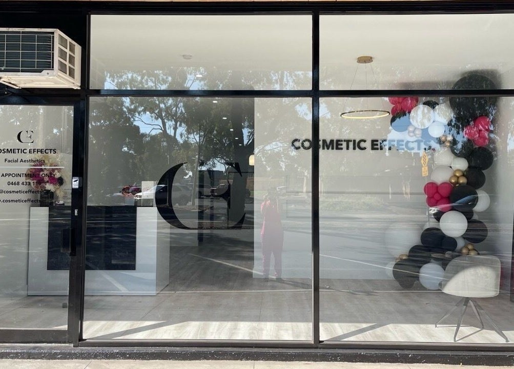 Cosmetic Effects entrance with balloon decor in Ivanhoe, Victoria, AU. Modern glass facade with logo.