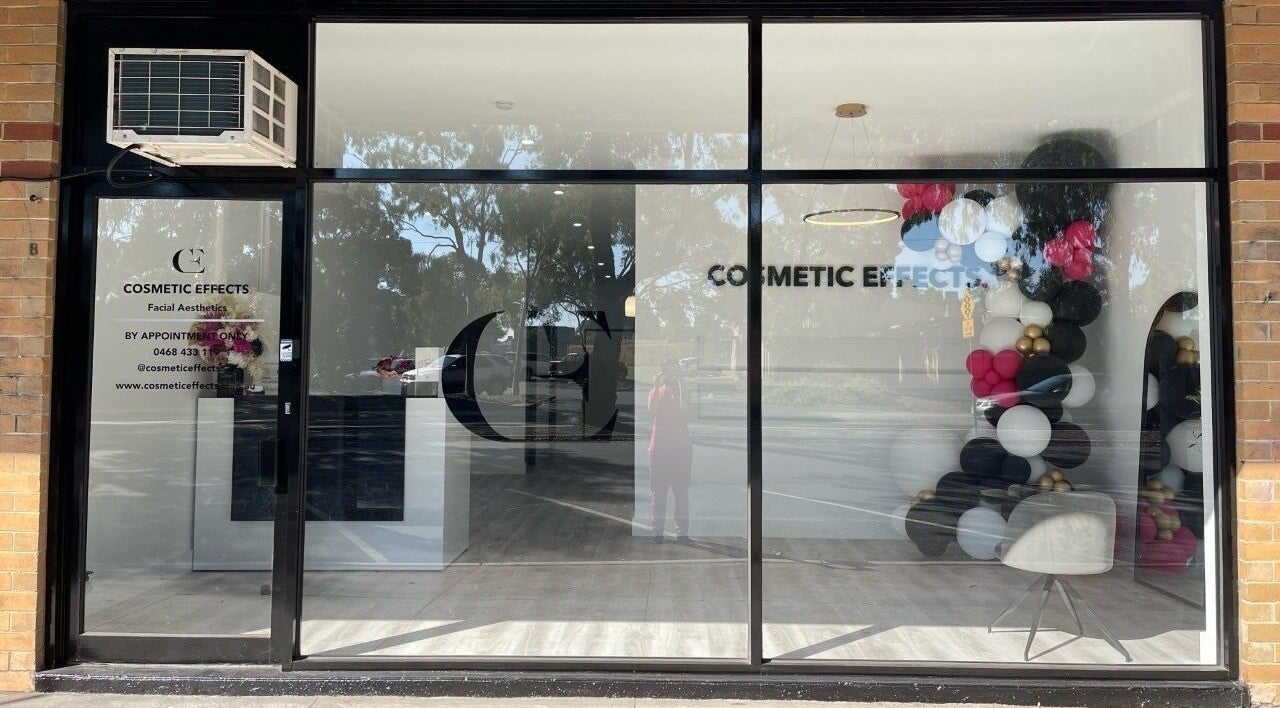 Cosmetic Effects entrance with balloon decor in Ivanhoe, Victoria, AU. Modern glass facade with logo.