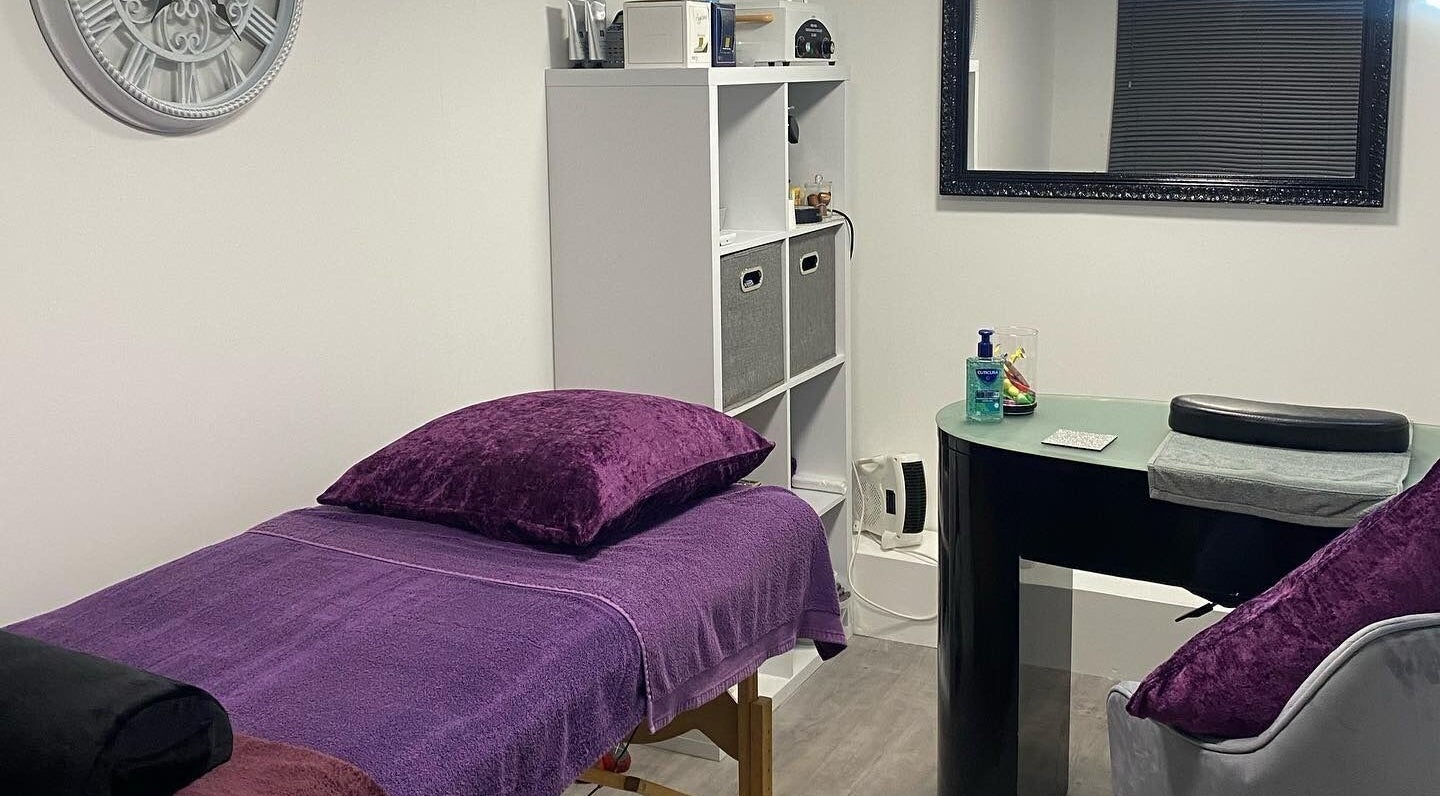 Beauty By Charlie's tranquil treatment space in Wokingham, England, GB, featuring a plush therapy bed.