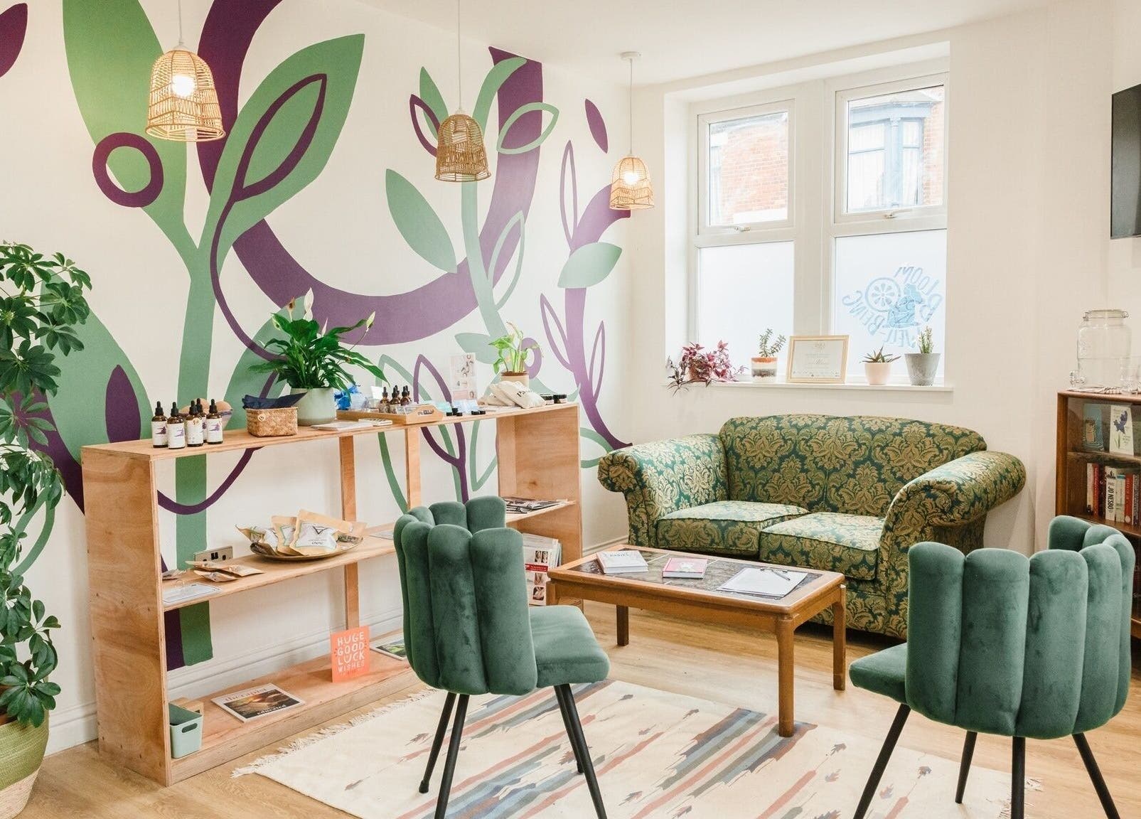 Bloom Well Being seating area with green decor in Newcastle upon Tyne, England, GB.