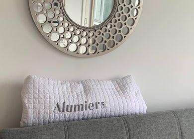 Stylish round mirror and cushion at The Peel Queen, Addlestone, England, GB.