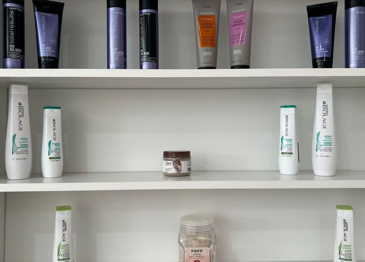 Hair care product display at Intime Ladies Salon in دبي, دبي, AE, featuring premium brands.