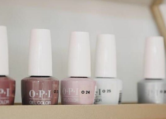 Stylish nail polish bottles displayed at Supreme Nail Spa, Toronto, Ontario, CA.