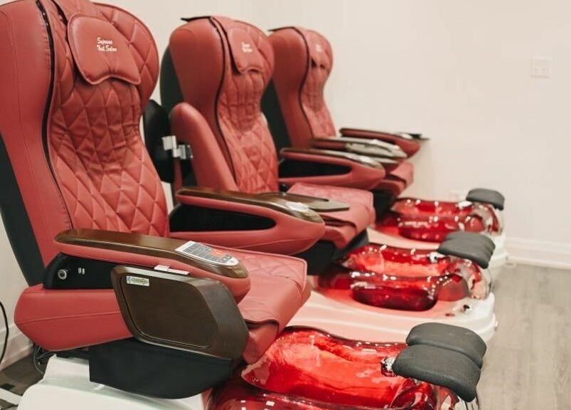 Elegant pedicure chairs at Supreme Nail Spa, Toronto, Ontario, CA offering luxurious nail care services.