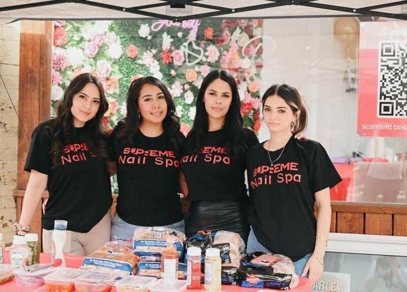 Team at Supreme Nail Spa in Toronto, Ontario, CA stands together showcasing community spirit and services.
