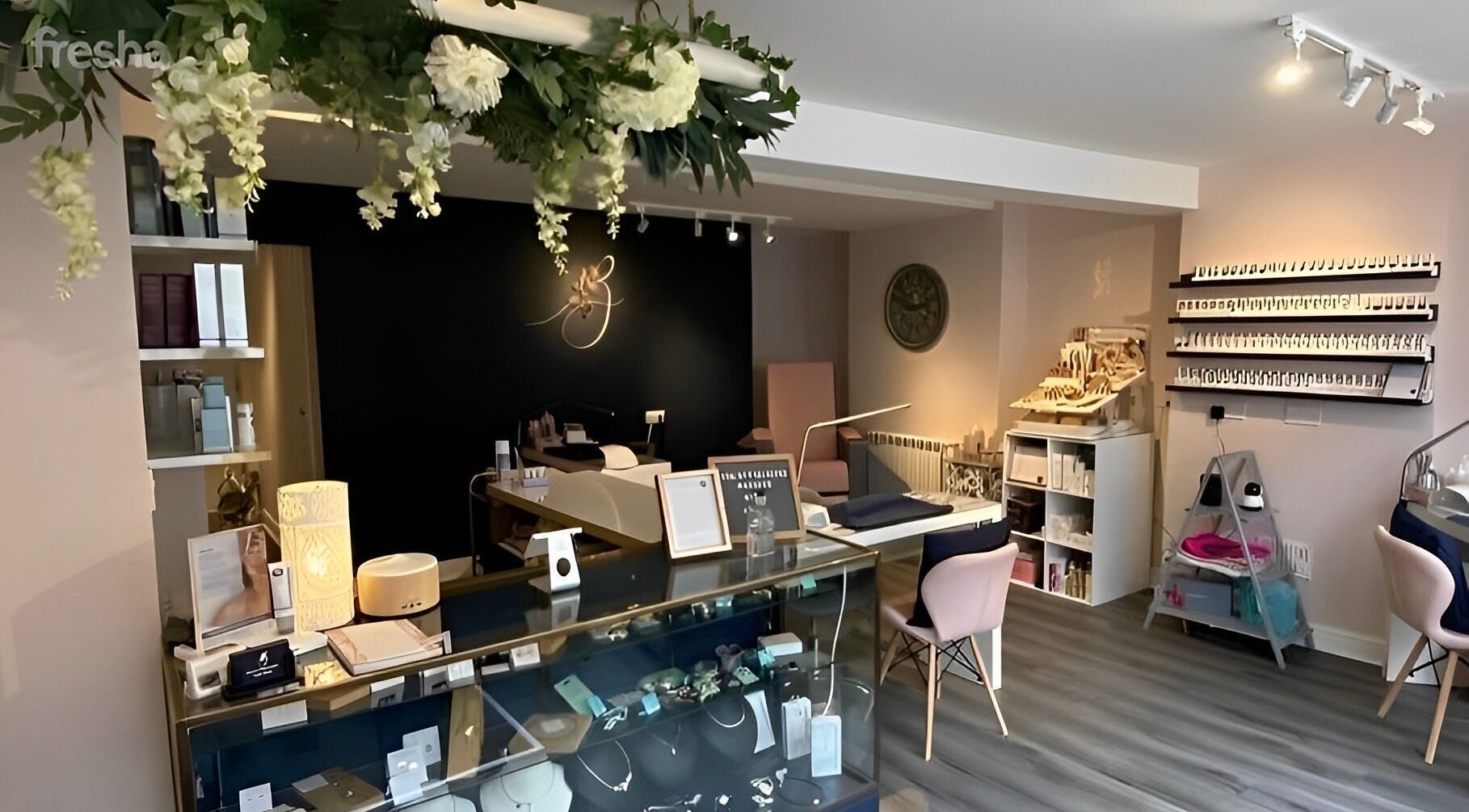 Interior of Beauty Boutique Bromyard Ltd in Bromyard, England, featuring elegant decor and treatment stations.