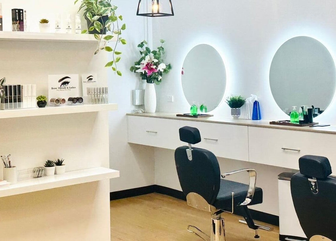 Modern beauty studio at Brow Threads & Lashes at Jetty Road, Glenelg, South Australia, AU with chic decor and mirrors.