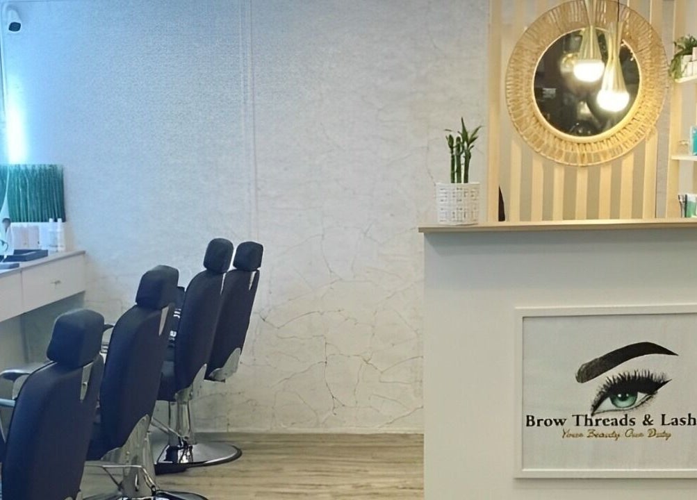 Chic interior of Brow Threads & Lashes at Jetty Road, Glenelg, South Australia, AU featuring stylish salon chairs.