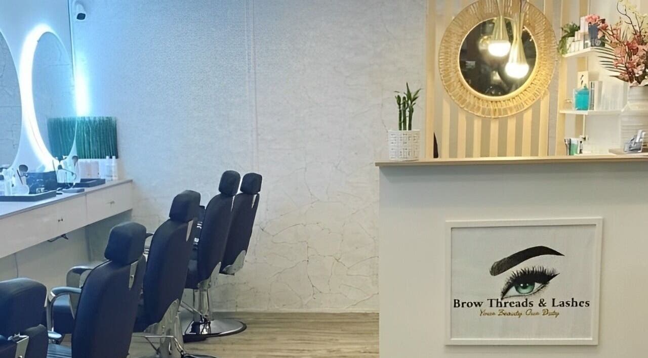 Chic interior of Brow Threads & Lashes at Jetty Road, Glenelg, South Australia, AU featuring stylish salon chairs.