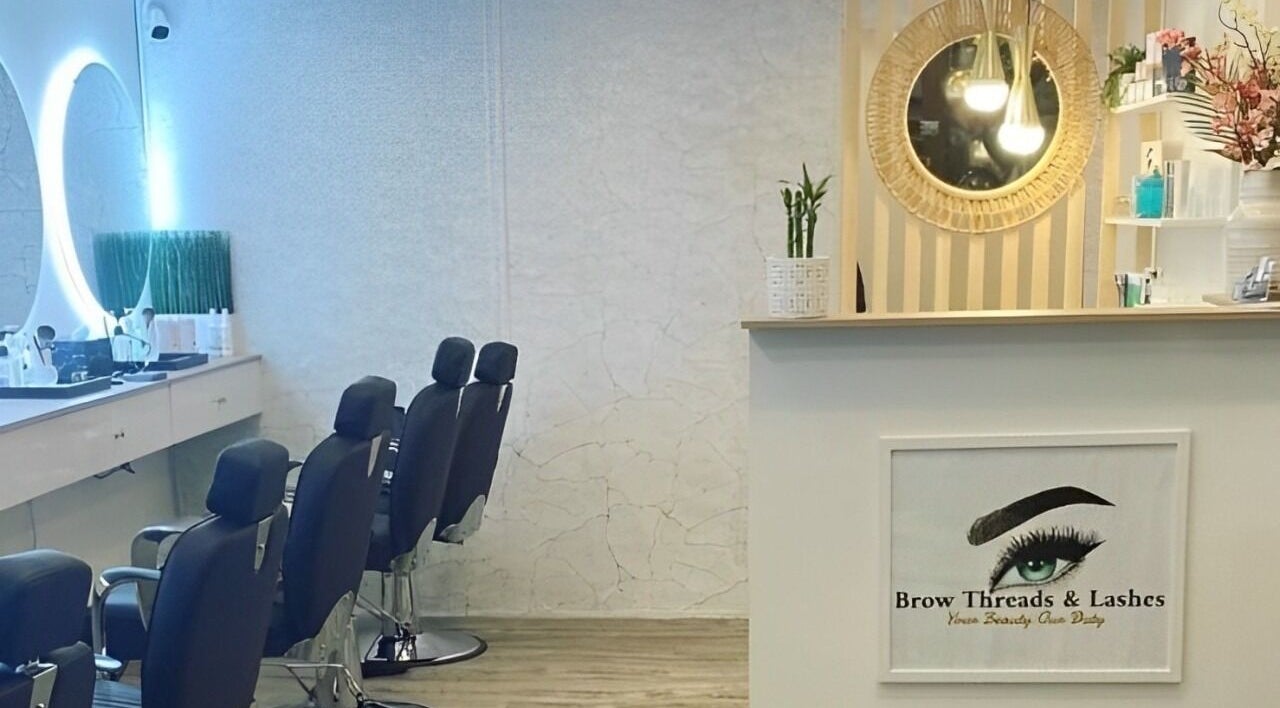 Chic interior of Brow Threads & Lashes at Jetty Road, Glenelg, South Australia, AU featuring stylish salon chairs.