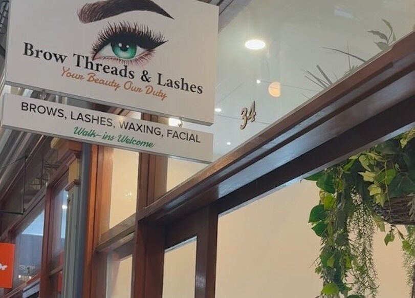 Sign of Brow Threads & Lashes at Jetty Road, Glenelg, South Australia, AU, invites with its lush beauty services.